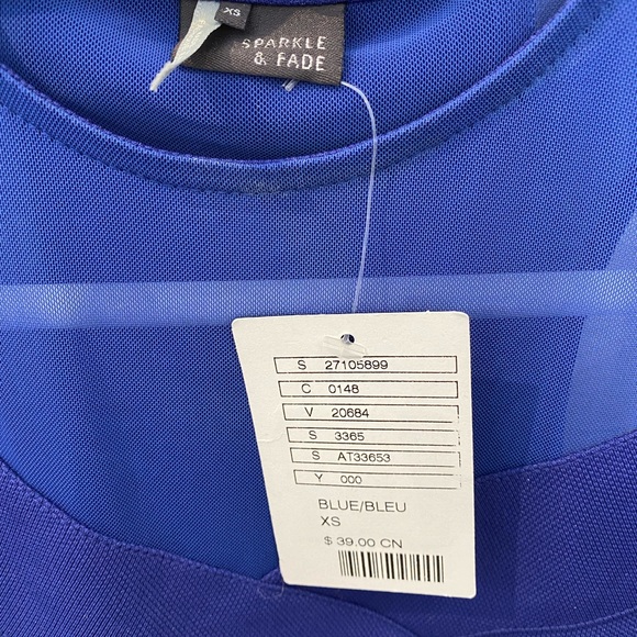 Blue cropped top with bandage features. - Picture 2 of 4